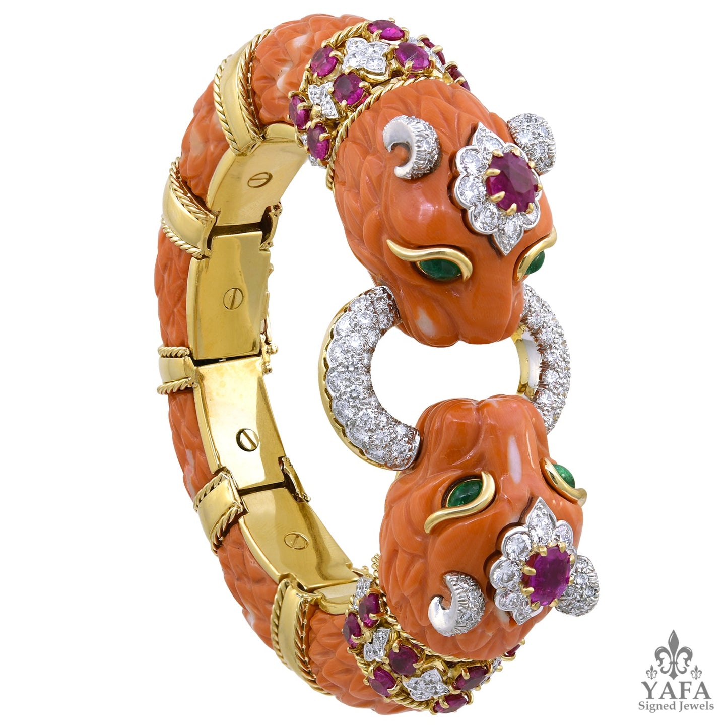 DAVID WEBB Carved Coral, Emerald, Ruby, Diamond Twin Lion Bracelet