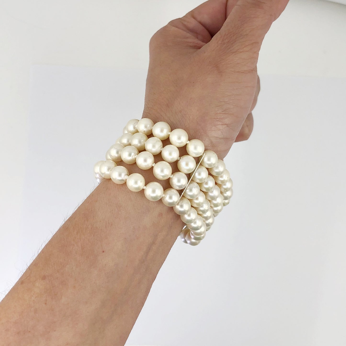 Four Row Pearl, Diamond Emerald Bracelet