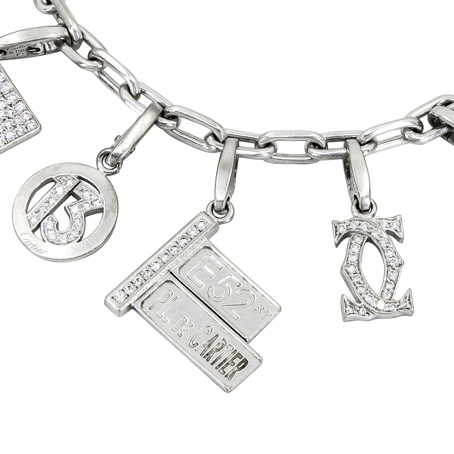 CARTIER 18K White Gold, Diamond, Turquoise, Ruby and Enamel 10-Charm Bracelet