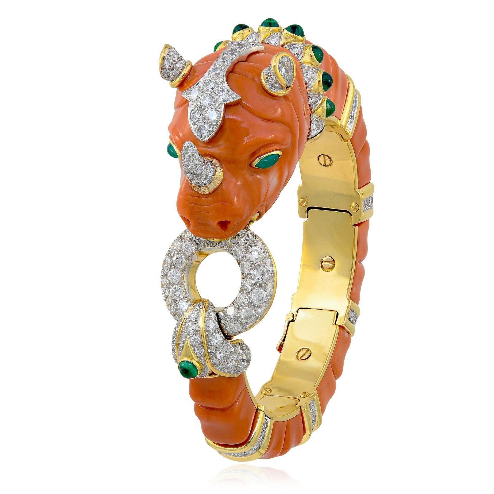 DAVID WEBB Carved Coral, Cabochon Emerald and Diamond “Rhino” Bracelet