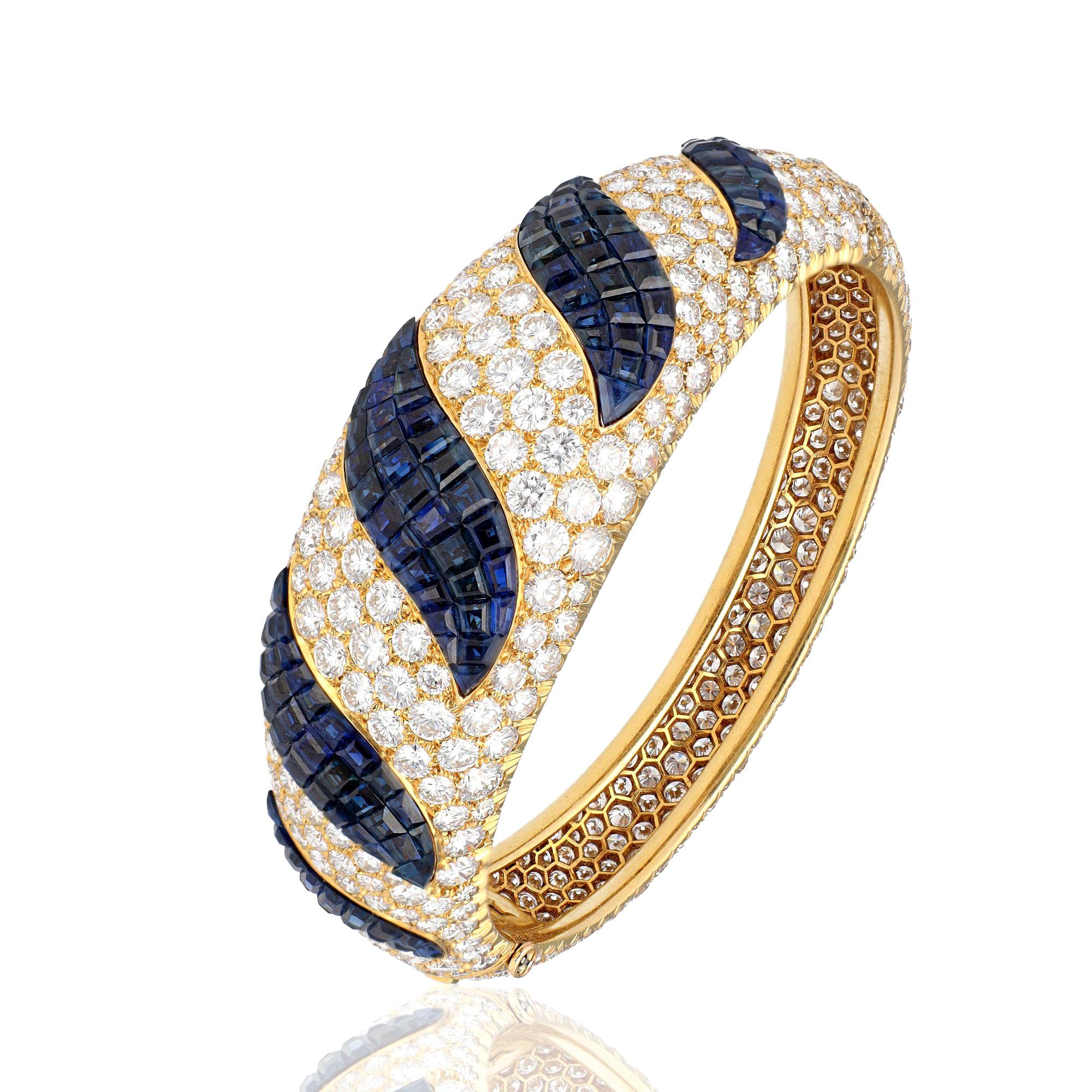 VAN CLEEF & ARPELS Diamond and sapphire Mystery Set Bangel and Earrings Set