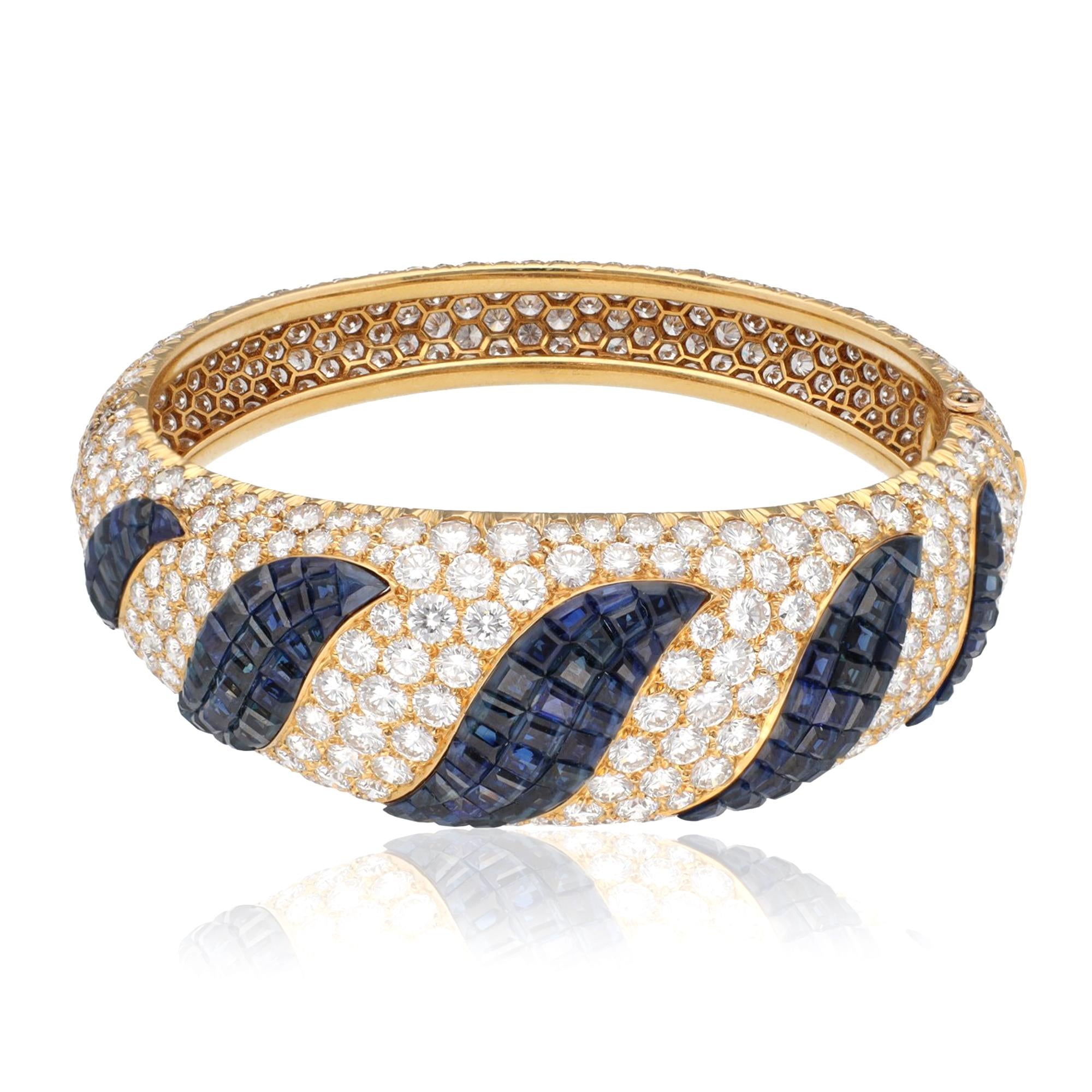 VAN CLEEF & ARPELS Diamond and sapphire Mystery Set Bangel and Earrings Set