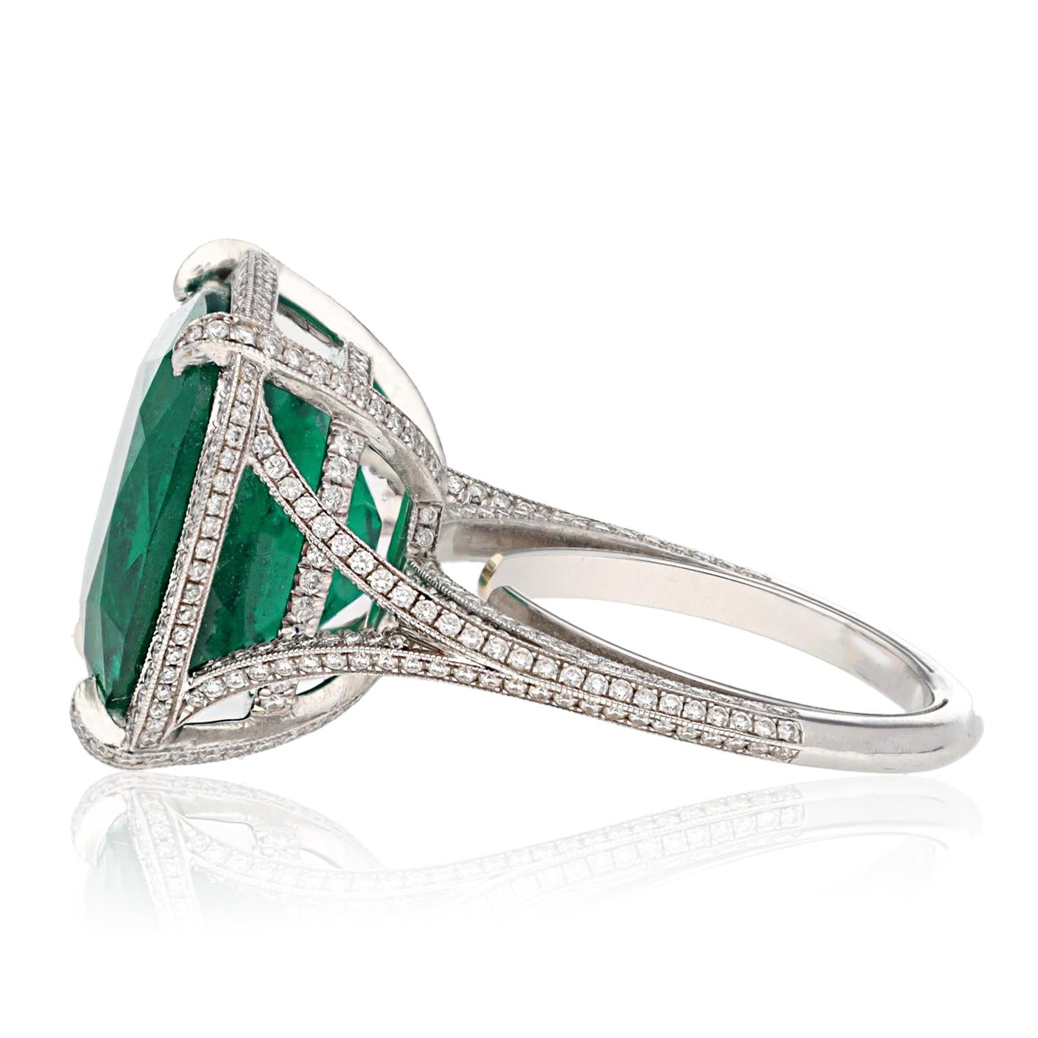 Platinum Diamond and Cushion-Cut Emerald Halo Ring