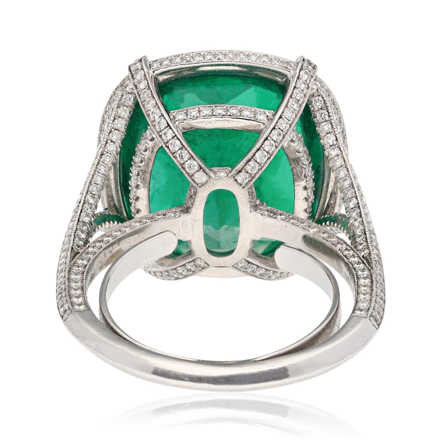 Platinum Diamond and Cushion-Cut Emerald Halo Ring
